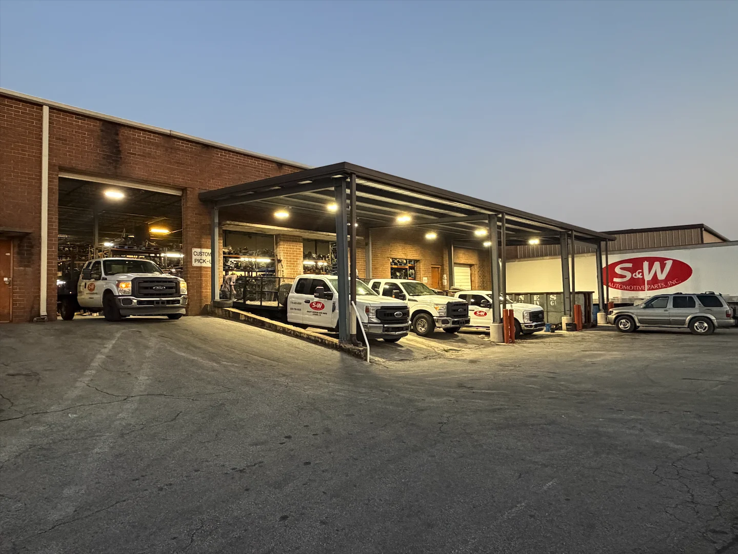 S&W Automotive Parts building and customer pickup area in Lithonia, Georgia